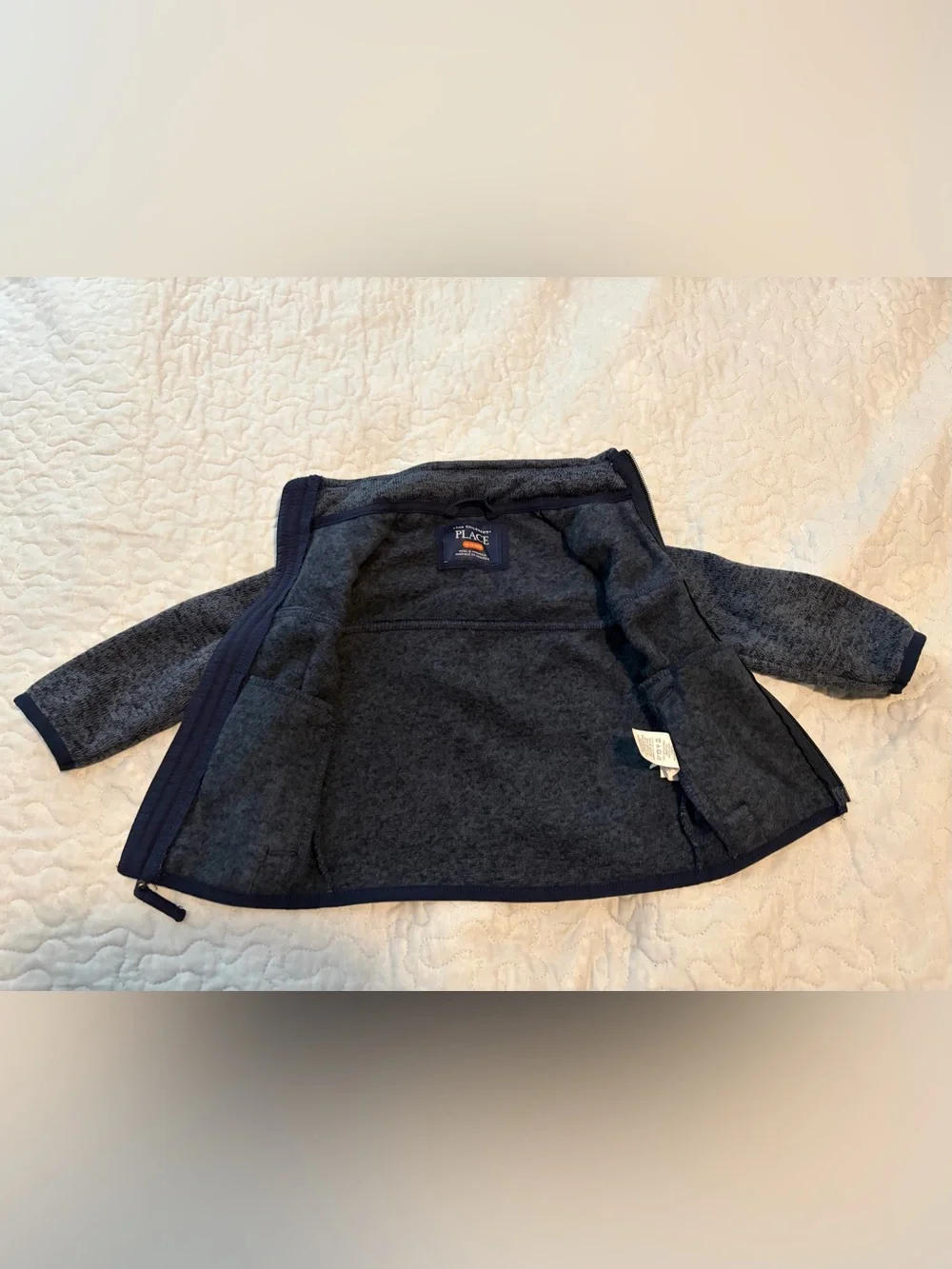 The Children’s place 12-18 month zip up navy jacket